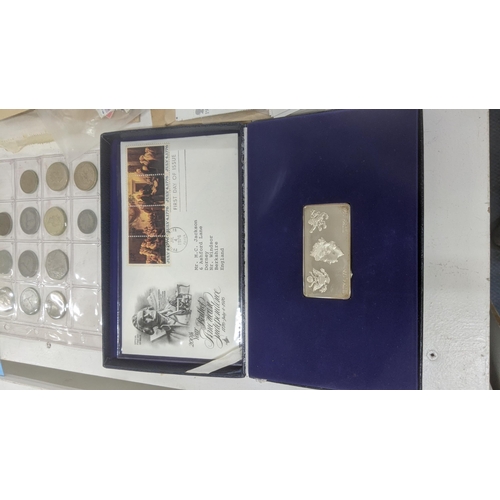 163 - A quantity of first day covers together with mainly British stamps loose and an album of coins form ... 