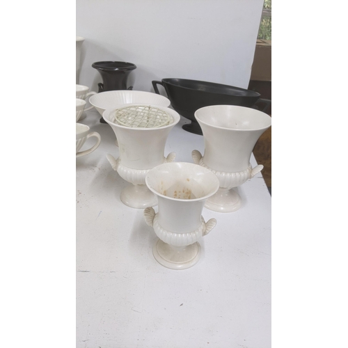 197 - A group of Wedgwood Etruria to include vases and others
Location: 11-4
If there is no condition repo... 