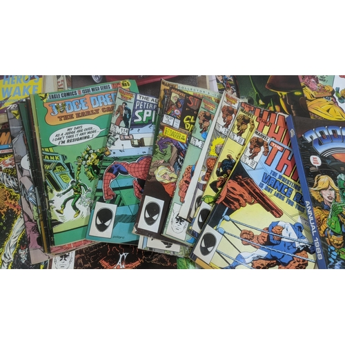 204 - A mixed lot to include Marvel comics and others, Classic Car magazines, mixed children's books and a... 