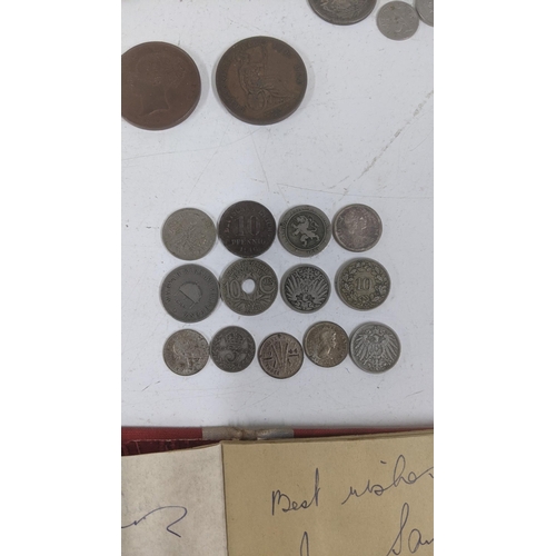 211 - Mixed coinage, mostly British to include some silver examples to include a 1926 three pence and othe... 