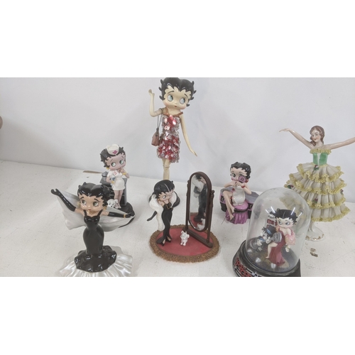 214 - A group of Betty Boop figures some A/F, together with a German figure, Fones Friends, boxed and egg ... 