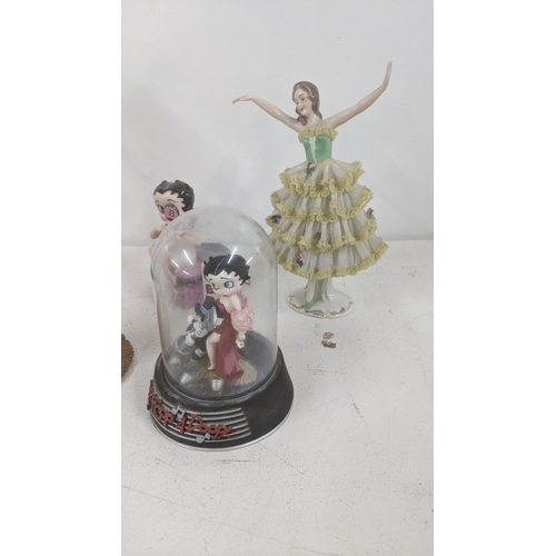 214 - A group of Betty Boop figures some A/F, together with a German figure, Fones Friends, boxed and egg ... 