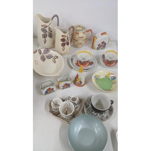 215 - Mixed ceramics to include Clarice Cliff style teapot, pepper pot and others, together with Carlton w... 