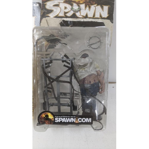 219 - Spawn toys to include three toys and a full album of Spawn collectors cards
Location: 5-4
If there i... 