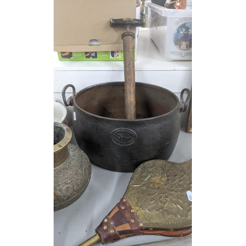 225 - Metalware and pottery items to include twin handled cast iron bucket, a brass bellows, a copper kett... 