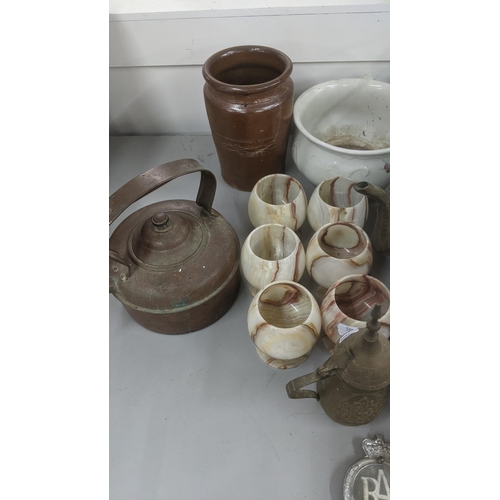 225 - Metalware and pottery items to include twin handled cast iron bucket, a brass bellows, a copper kett... 