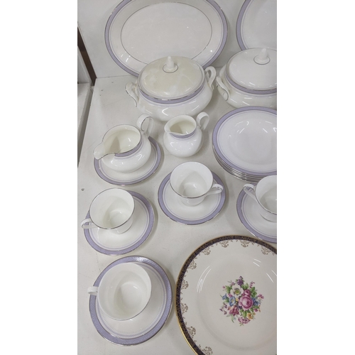 3 - A Royal Doulton Lilac Time pattern part dinner/tea service to include two tureens, platter, cups and... 