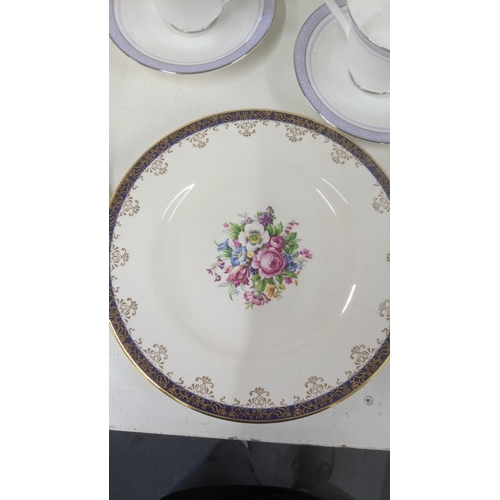 3 - A Royal Doulton Lilac Time pattern part dinner/tea service to include two tureens, platter, cups and... 