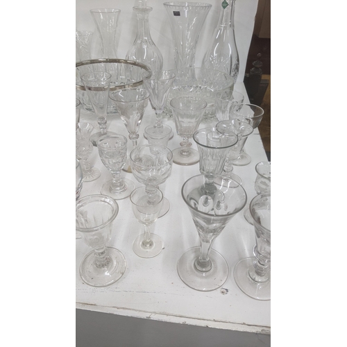 35 - Mixed 19th century and later glassware to include a variety of sherry glasses, a 19th century ruby r... 