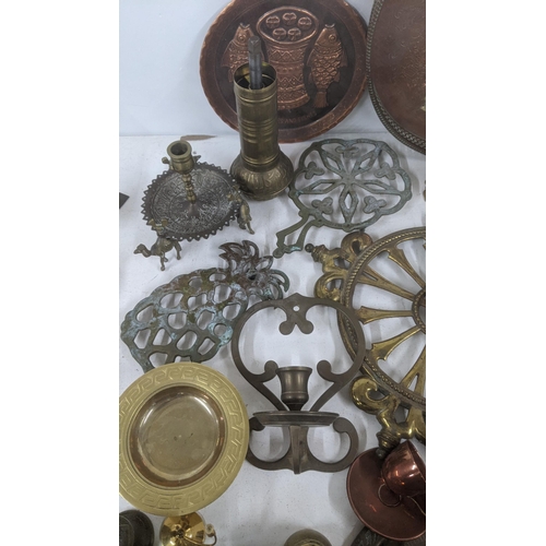 361 - Mixed brassware and metalware to include scale weights, a pair of candlesticks, miniature items made... 