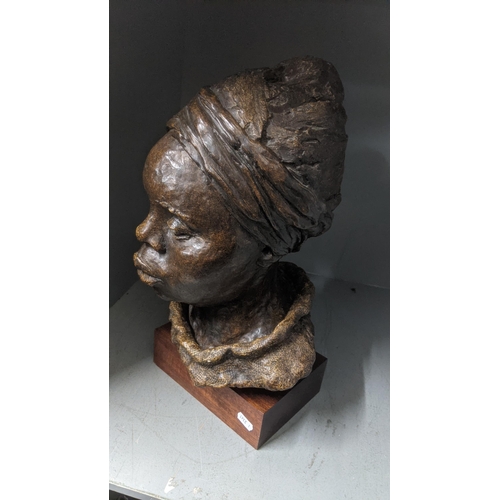 370 - A 20th century African composite bust on a wooden plinth, 45cm h
Location: LWB
If there is no condit... 