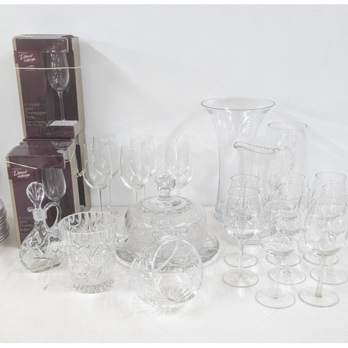 4 - Glassware to include three boxes of Champagne flutes, wine glasses, a crystal cut glass cake dish, a... 