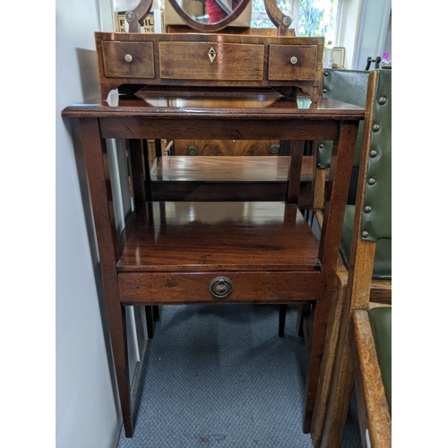 332 - A two-tier stand with a single drawer, and an early 20th century shield shaped toilet mirror with th... 