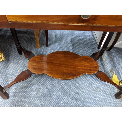 335 - A late 19th/early 20th century mahogany and boxwood inlaid two tier table with a single drawer and a... 