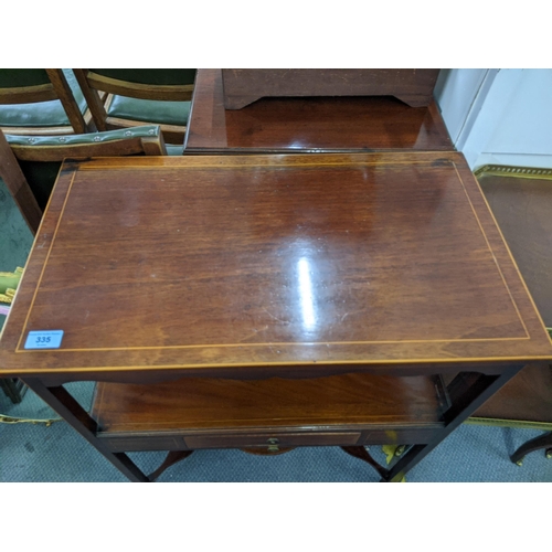 335 - A late 19th/early 20th century mahogany and boxwood inlaid two tier table with a single drawer and a... 