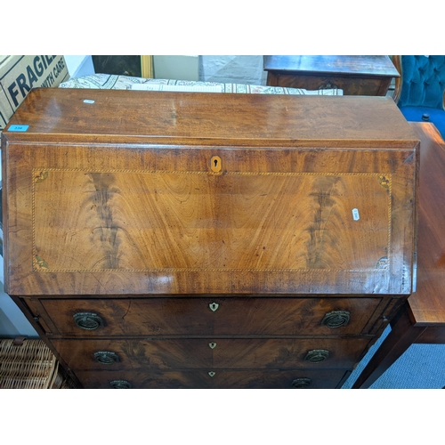 336 - A George III flame mahogany bureau with satinwood and ebony inlay with a fall flap, three drawers, r... 