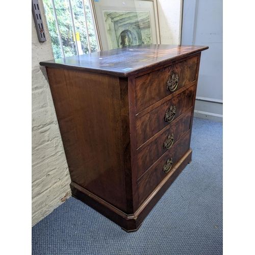 339 - A Georgian flame mahogany four drawer marriage chest of drawers with brass handles raised on a plint... 