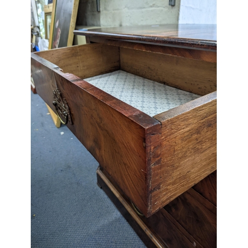 339 - A Georgian flame mahogany four drawer marriage chest of drawers with brass handles raised on a plint... 