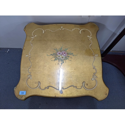 355 - A pair of modern painted gold French style side table with a glass top and floral design to the top ... 