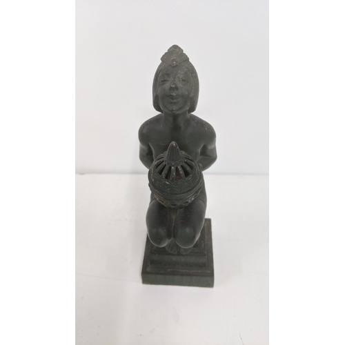 98 - An Art Deco spelter cast incense holder fashioned as a female nude, 24cm h
Location:
If there is no ... 