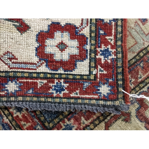 499 - A Kozak Caucasian rug with geometric motifs and a blue ground, 137cm x 88cm
Location: RAB
If there i... 