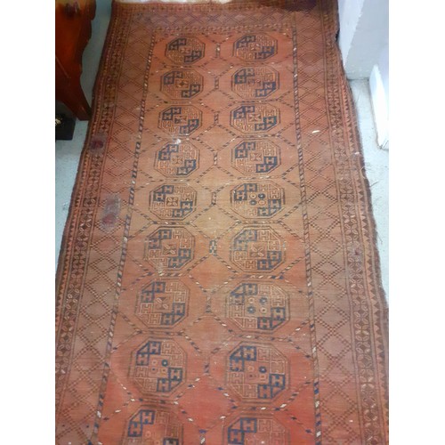 502 - Two Turkish rugs comprising a brown ground rug 240cm x 127cm and a smaller red and blue ground praye... 