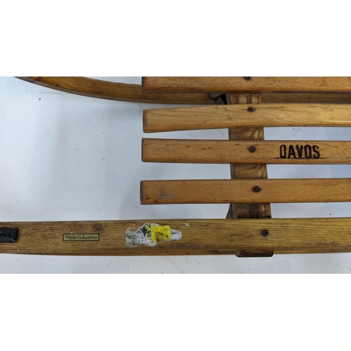 265 - A vintage Austrian sledge measuring 91cm x 29cm
Location: SR
If there is no condition report, please... 