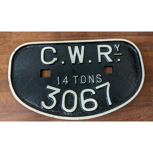 299 - Railway Interest - A British Rail white railway lamp, a GWR whistle, and a cast iron GWR locomotive ... 