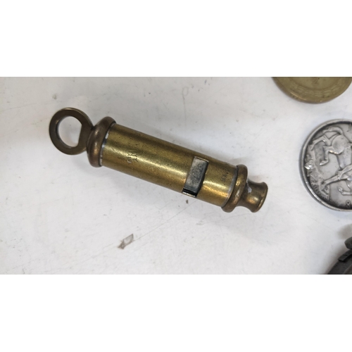 40 - Militaria items to include two WW1 medals, one marked 9960 LACC Smith RAF, a military compass and a ... 