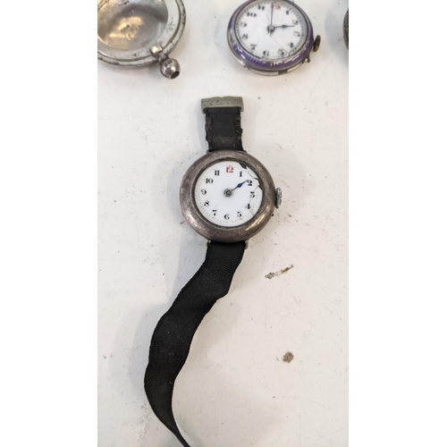 403 - A group of ladies silver pocket watches and fob watches A/F, one with a purple enamelled bezel
Locat... 