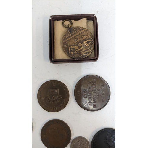 43 - A collection of coins and collectable items to include a cartwheel penny dated 1797, a coin from the... 