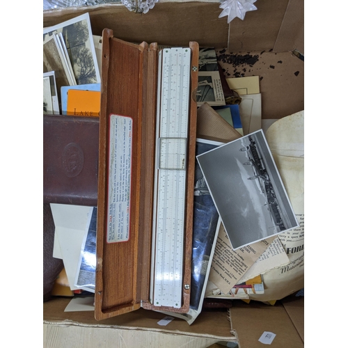 457 - A mixed lot comprising photography accessories and ephemera, vintage postcards and photos, aviation ... 