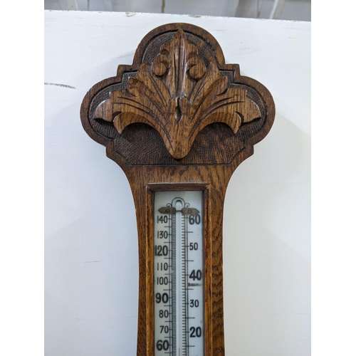 464 - Tw early 20th century barometers in decorative oak frames Location: LWF
If there is no condition rep... 