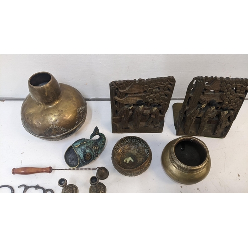 49 - Metalware to include Tibetan singing bowl, two corkscrews, candlesticks and a glass ball
Location: 6... 