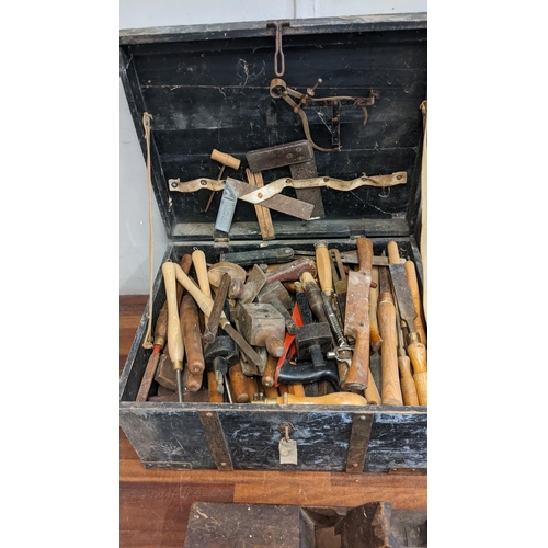 490 - A collection of tools to include a vintage tool chest filled with files, chisels, set squares and ot... 