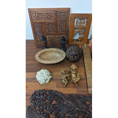 51 - Treen to include carved Indian figures, panels, bowl and other items
Location: 7-1
If there is no co... 