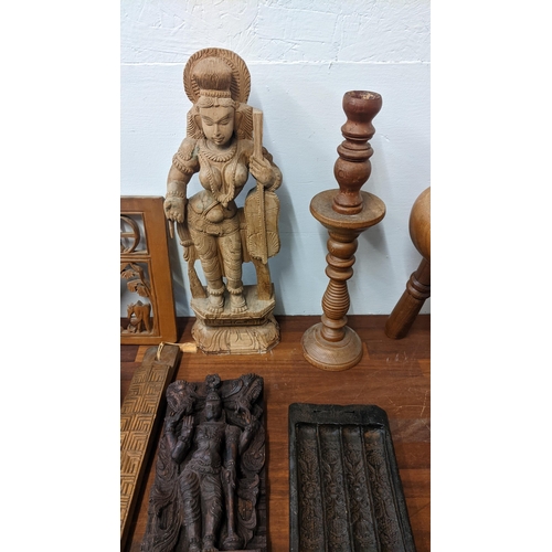 51 - Treen to include carved Indian figures, panels, bowl and other items
Location: 7-1
If there is no co... 