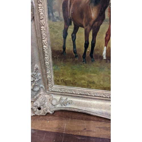 53 - An early 20th century oil on canvas depicting five horse in a field, signed W Cheeman, in a gilt fra... 