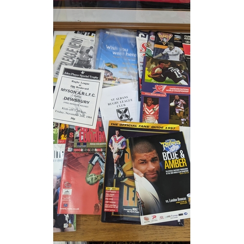 57 - Rugby League interest - a collection of mostly London Broncos home and away programmes, along with o... 