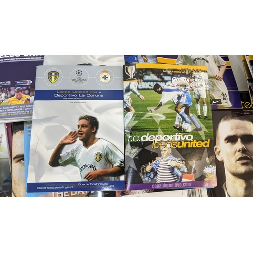 59 - A collection of Leeds United home and away programmes dating from 1986-2005 to include Champions Lea... 