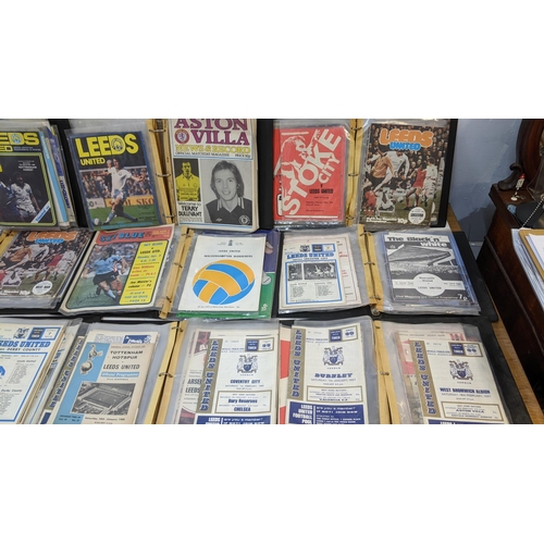 60 - A large collection of Leeds United football programmes dating from 1966-1984, filed chronologically ... 