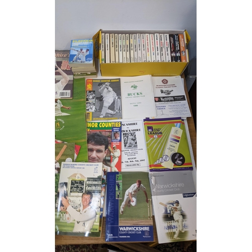 62 - A mixed lot of sporting related publications to include Playfair Cricket Annuals, International foot... 