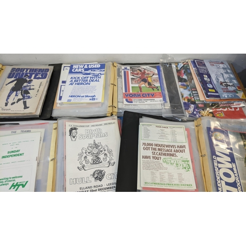 62 - A mixed lot of sporting related publications to include Playfair Cricket Annuals, International foot... 