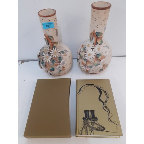 497 - A mixed lot comprising a pair of floral relief vases and vintage books to include a 1996 Folio Socie... 