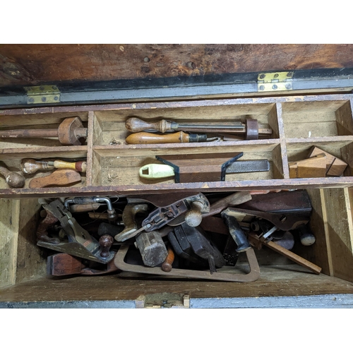 153 - An early 20th century tool chest containing various wooden woodworking tools, planes etc Location: G... 