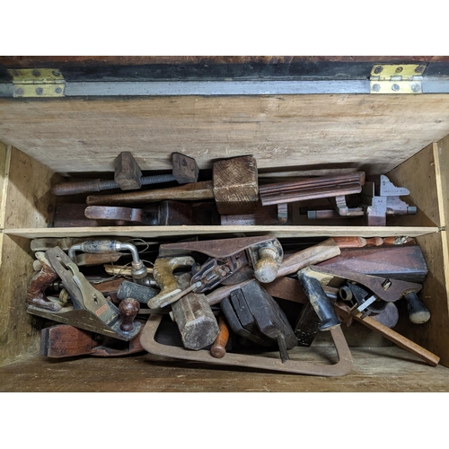 153 - An early 20th century tool chest containing various wooden woodworking tools, planes etc Location: G... 