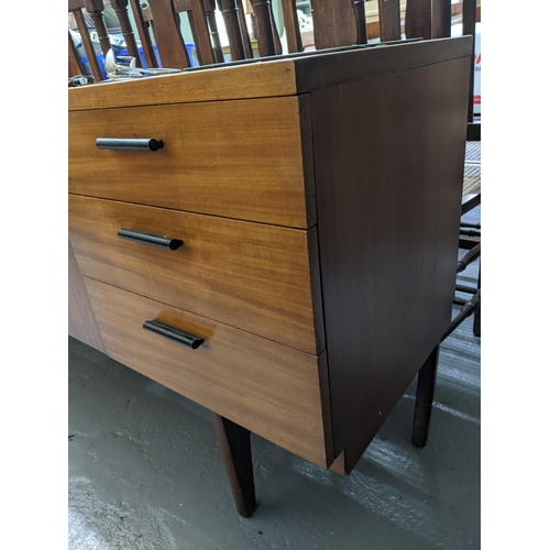 157 - A mid-century retro Uniflex teak sideboard with leather clad handles, cutlery drawer above two furth... 