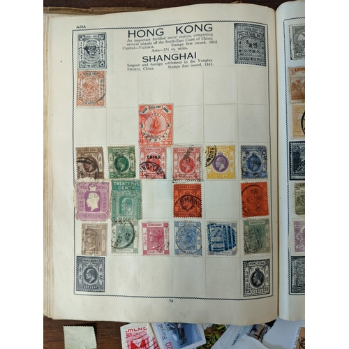 293 - Stamps- Mixed 19th century and later postage stamps from around the world in an album and loose
Loca... 