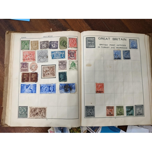 293 - Stamps- Mixed 19th century and later postage stamps from around the world in an album and loose
Loca... 