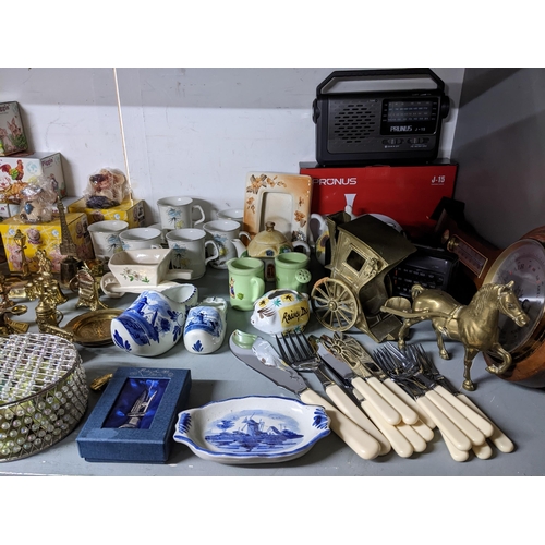 70 - A mixed lot to include a Carlton suitcase, a Ginni handbag in dust bag, various ornaments including ... 